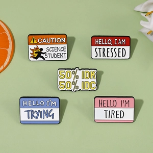Set of 5 colorful enamel name tag pins with humorous quotes like Hello I'm Tired