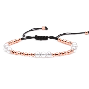 Adjustable woven bracelet with 4mm copper beads and 6mm faux pearls on black cord