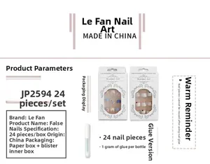 Short yellow French press-on nails set with glitter lines and 24 pieces in window box