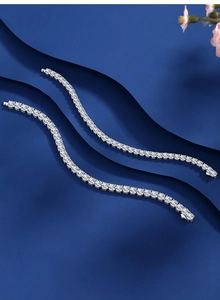 Detailed macro view of S925 sterling silver tennis bracelets with square sparkling cubic zirconia