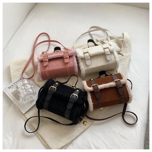 Detail of plush crossbody bags in pink, beige, black, and brown with adjustable straps