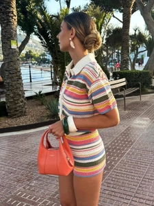 Chic polo collar striped knit romper in vibrant pink, blue, and green stripes for spring