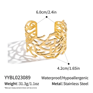 Detail shot of 18K gold plated coral branch bangle with size and weight dimensions