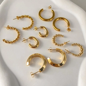 Collection of trendy gold-plated stainless steel C-shaped hoop earrings for women