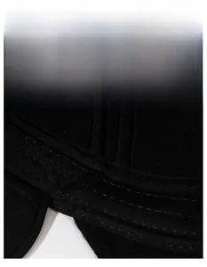 Detail of moisture-wicking black sport headband fabric with fine flatlock stitching