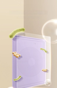 Detail of purple silicone baking mat showing anti-bacterial Ag+ ions and precise scale