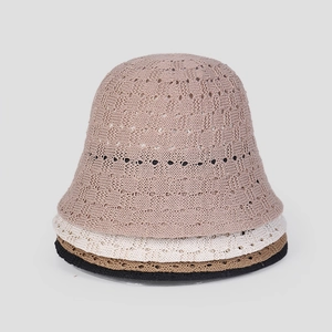 Breathable knit bucket hats for women in four solid colors featuring hollow-out patterns