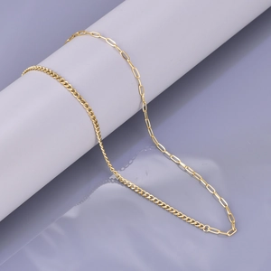 18K gold plated asymmetric curb and paperclip chain necklace on gray display