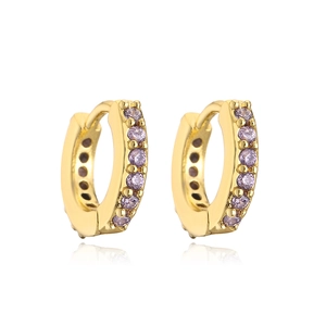 Close-up of gold-plated hoop earrings featuring micro-pave purple zircon stones