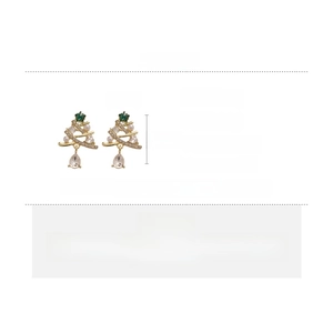 Detailed view of silver needle Christmas tree earrings with pearls and water drop charms