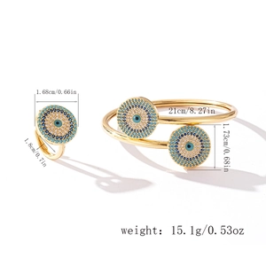 Detail view of evil eye jewelry set dimensions with gold bracelet and ring measurements