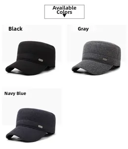Detail view of winter flat top caps in black, grey, and navy with metal logo plates