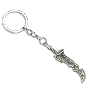 Unique bronze sword metal keychain with intricate engraved patterns on white background