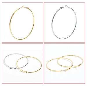 Detailed views of gold and silver hoop earrings from four different angles and perspectives