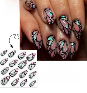 Detail of 3D butterfly press-on nails with pink pearl gradient and black wing pattern