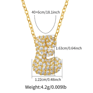 Detail of gold letter E pendant with dimensions 1.63cm by 1.22cm and chain specs