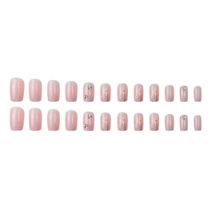 Pink gradient press-on nails with glitter, daisy floral art, and rhinestone accents
