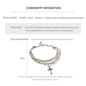 Detail view of multi-layer necklace with pearl chains, cross pendant and size specs