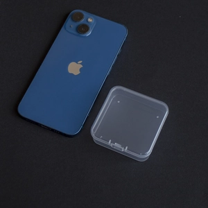 Transparent square PP plastic organizer box shown with phone for size comparison