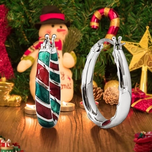 Christmas hoop earrings with festive red, green, and silver candy cane enamel patterns