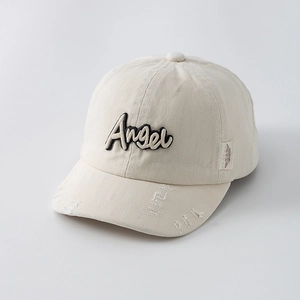 Close-up of cream white baseball cap with Angel embroidery and distressed brim details