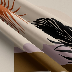 Détail du tissu bohème aux motifs de plantes abstraites et de soleil décoratif