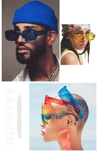 Detailed view of colorful retro rectangular sunglasses with thick frames and varied hues