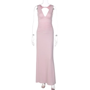 Detailed view of pink V-neck dress featuring elegant waist ruching and soft draped fabric