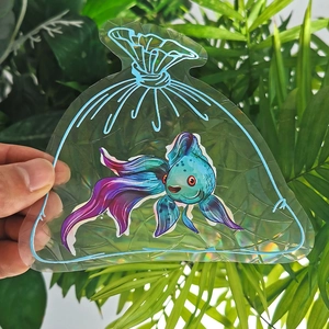 Rainbow suncatcher window film detail showing a goldfish design on a PVC sticker