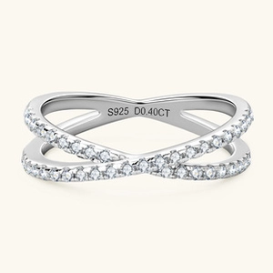 Close-up of S925 silver cross ring with pavé diamonds and D0.40CT inner engraving