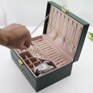 Green leather double-layer jewelry box with multi-compartment storage and watch display