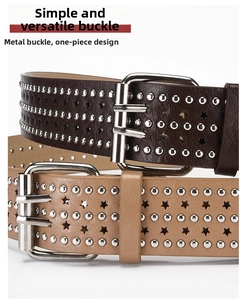 Detail view of punk rock belt featuring metal rivets and star cutouts on leather