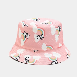 Detailed view of pink bucket hat with cute panda and rainbow prints on cotton fabric