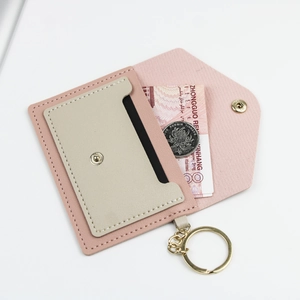 Pink and beige PU leather mini wallet with gold snap button and keychain attachment