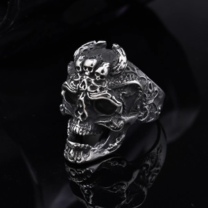 Vintage stainless steel skull ring with gothic rock style and retro silver finish