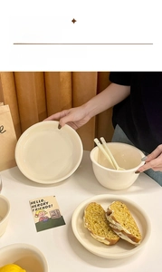 Detail of lead-free ceramic tableware set featuring heat-resistant glaze and beige finish