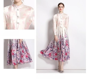 Detail of floral satin dress featuring stand collar buttons and flared A-line skirt