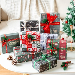 Christmas gift wrapping paper set with festive ribbons and decorative kraft paper boxes
