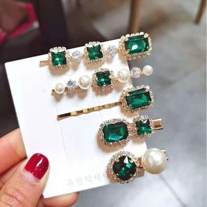 Five-piece set of vintage emerald rhinestone hair clips with gold finish and pearls