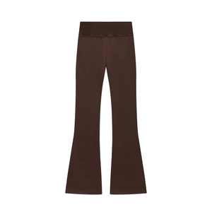 Flat lay of high waisted flared trousers in brown fabric with elastic waistband