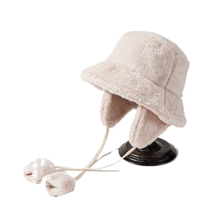 Fleece bucket hat with ear flaps and decorative pom-poms in a warm beige finish