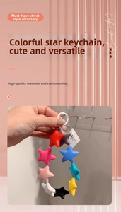 Colorful silicone star keychain with multi-color contrast design and white round clasp