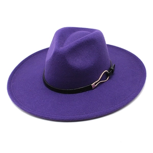 Detailed top view of deep purple wool fedora hat with thin leather band and gold metal buckle