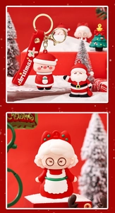 Close-up of a Christmas snowman keychain with colorful soft rubber cartoon figurines