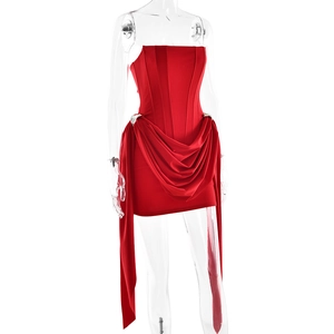 Detail of red strapless mini dress with waist pleats and long elegant ribbons