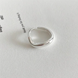 Minimalist 925 sterling silver irregular wave ring with adjustable open band design