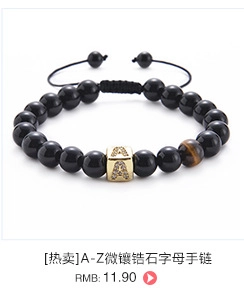 Detail of hand-woven 10mm tiger eye and agate bead bracelet with golden letter A charm