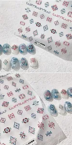 Detailed 5D embossed nail art stickers with Persian floral patterns and totem designs