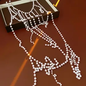 Luxurious multilayered glass pearl body chain necklace with elegant white beaded tassel strands