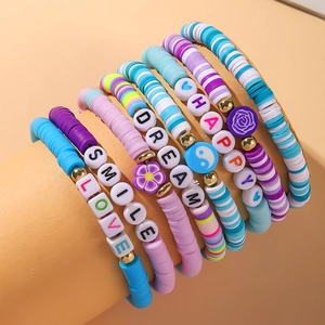 Handmade polymer clay bead bracelets with heart, flower motifs and letter beads